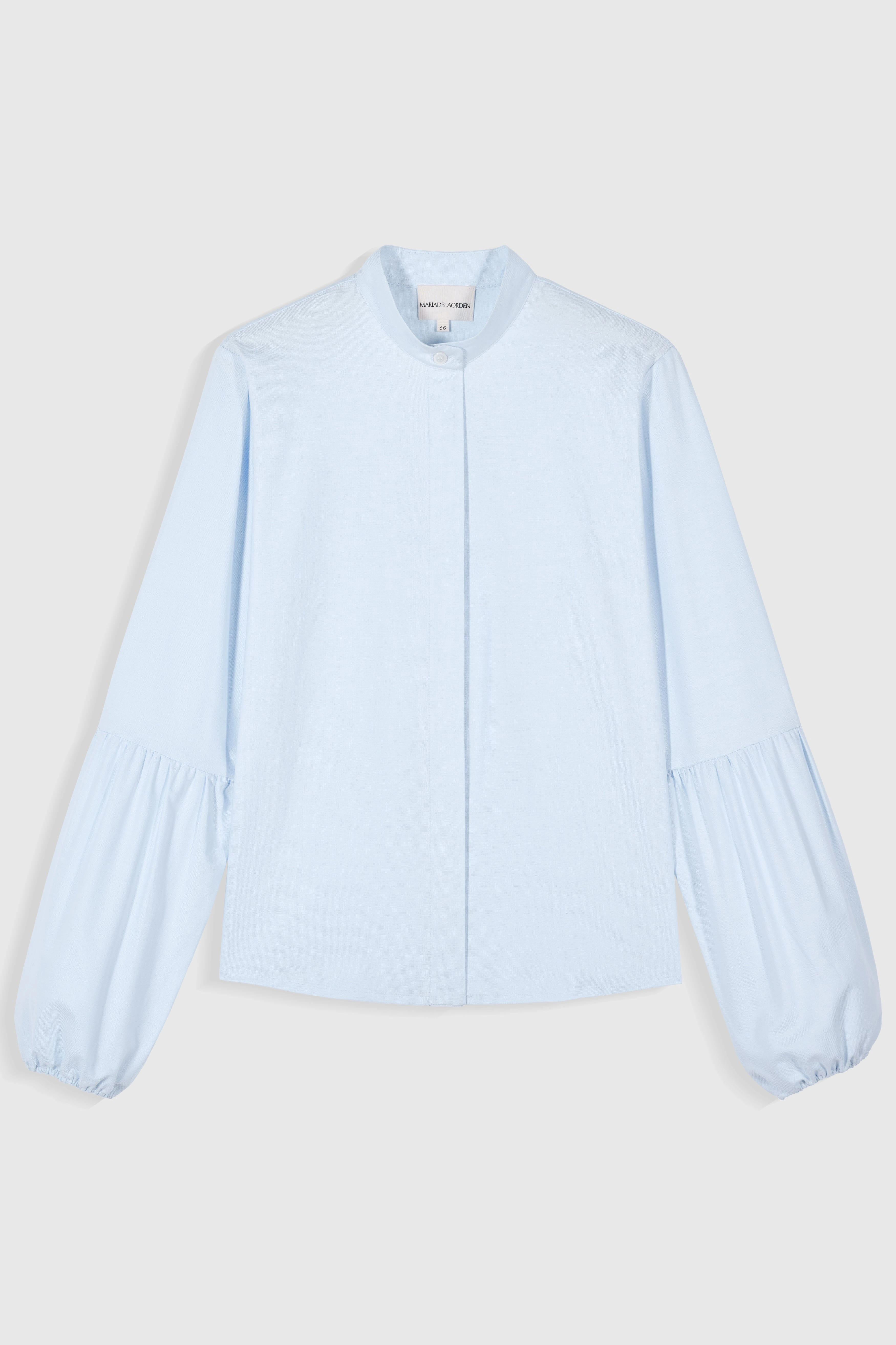 "Bella Camisa: Un Toque de Elegancia y Sofisticación para tu Día a Día."